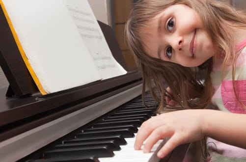 child-playing-piano Piano Success Stories | Real Students, Real Results